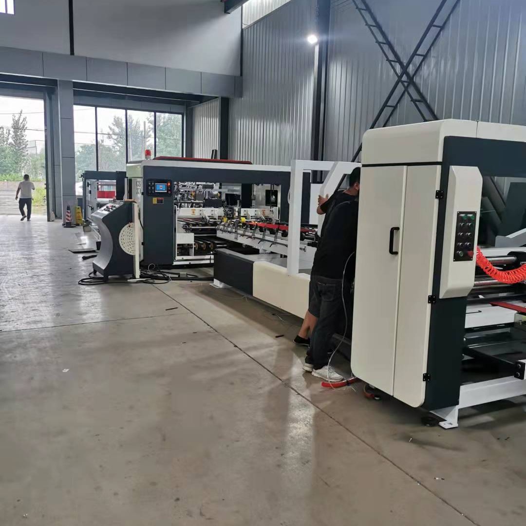 泉鑫科技包装机械 专业粘箱机生产厂家 打捆机厂家 专业包装机械生产厂家