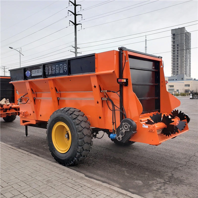 新疆齐齐哈尔有机肥撒肥机 干粪黏湿粪抛粪机 牵引式10方绞龙式撒粪车
