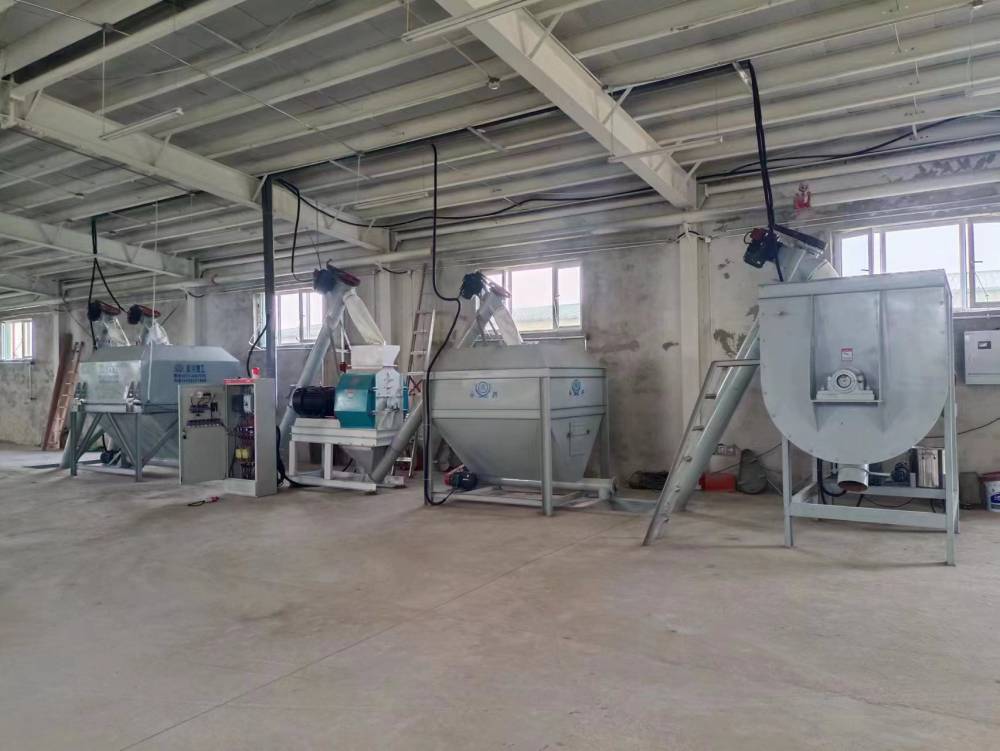 郑州永兴生产猪饲料成套加工机械设备厂